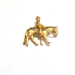 Vintage gold horse and rider pendant